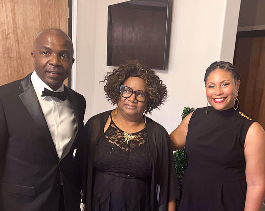 Geoffrey Bohanon, his mom and Michel Hambrick pose for a photo, while attending the third annual Garden to Table Gala for the St. Arbors Community Garden.