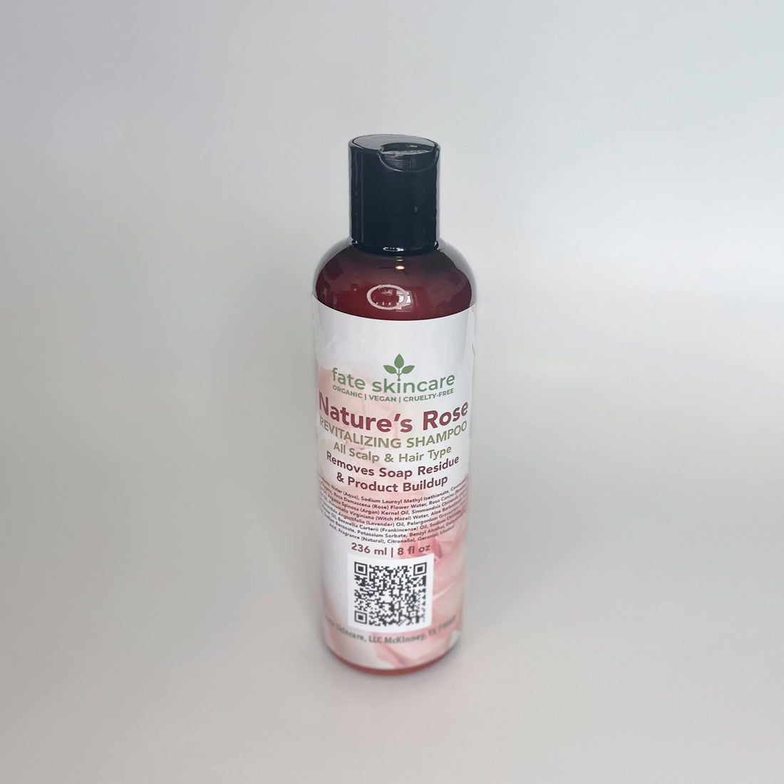 Nature's Rose Revitalizing Shampoo: Sunset-inspired rejuvenation in an amber bottle