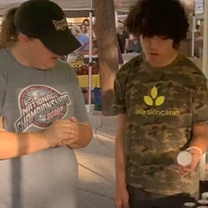 Members of Fate Skincare's youth entrepreneurship training program, working the McKinney Farmer's Market.