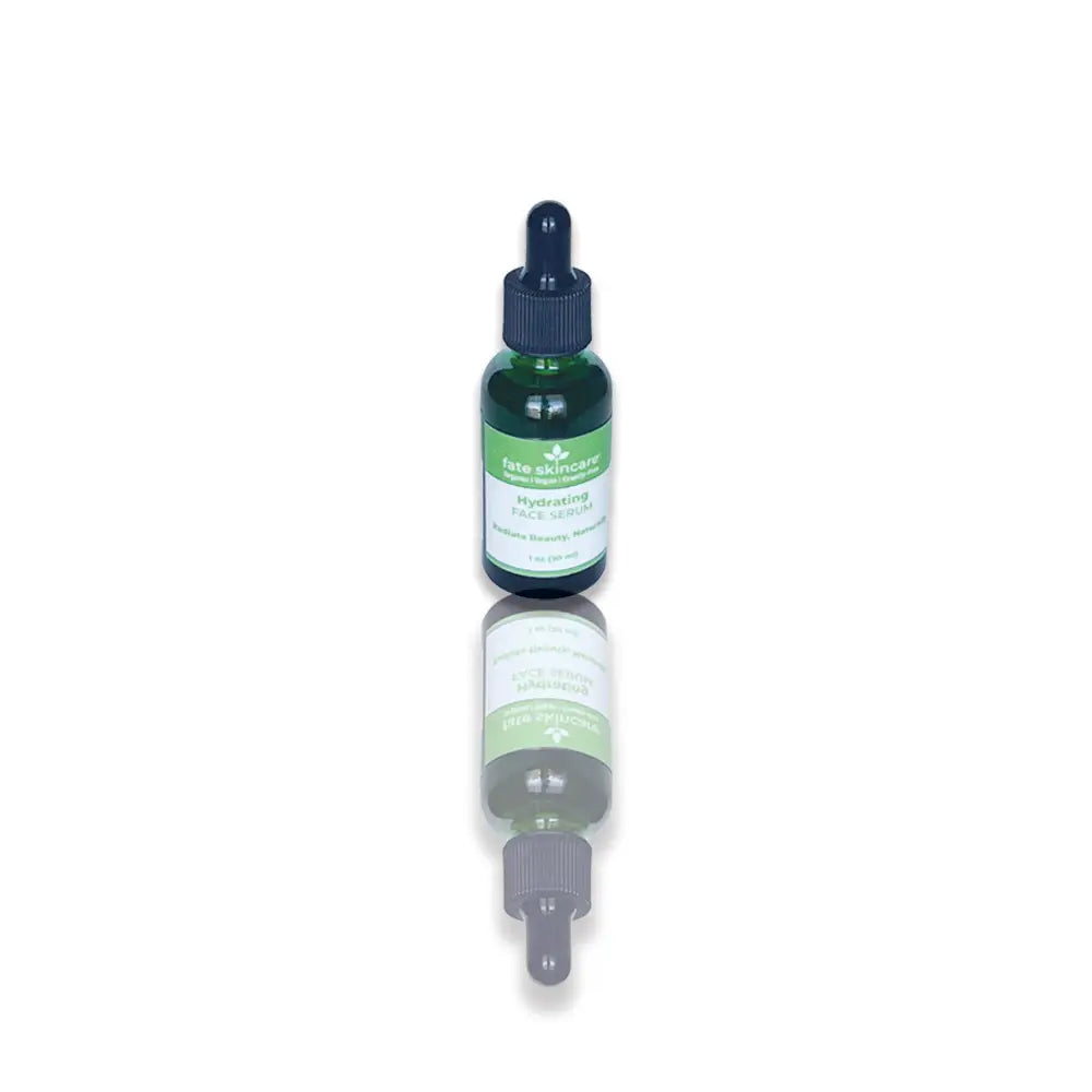 Hydrating Face Serum by Fate Skincare in a 1 oz green glass dropper bottle, formulated to replenish moisture, balance skin, and enhance radiance.