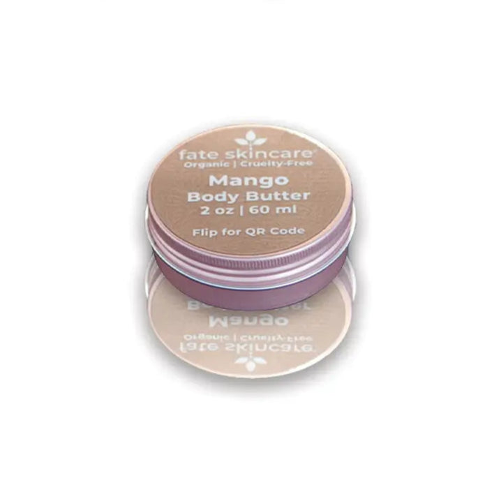 Mango Body Butter by Fate Skincare in a 2 oz rose gold tin, organic and cruelty-free moisturizer crafted to deeply hydrate and soften skin.