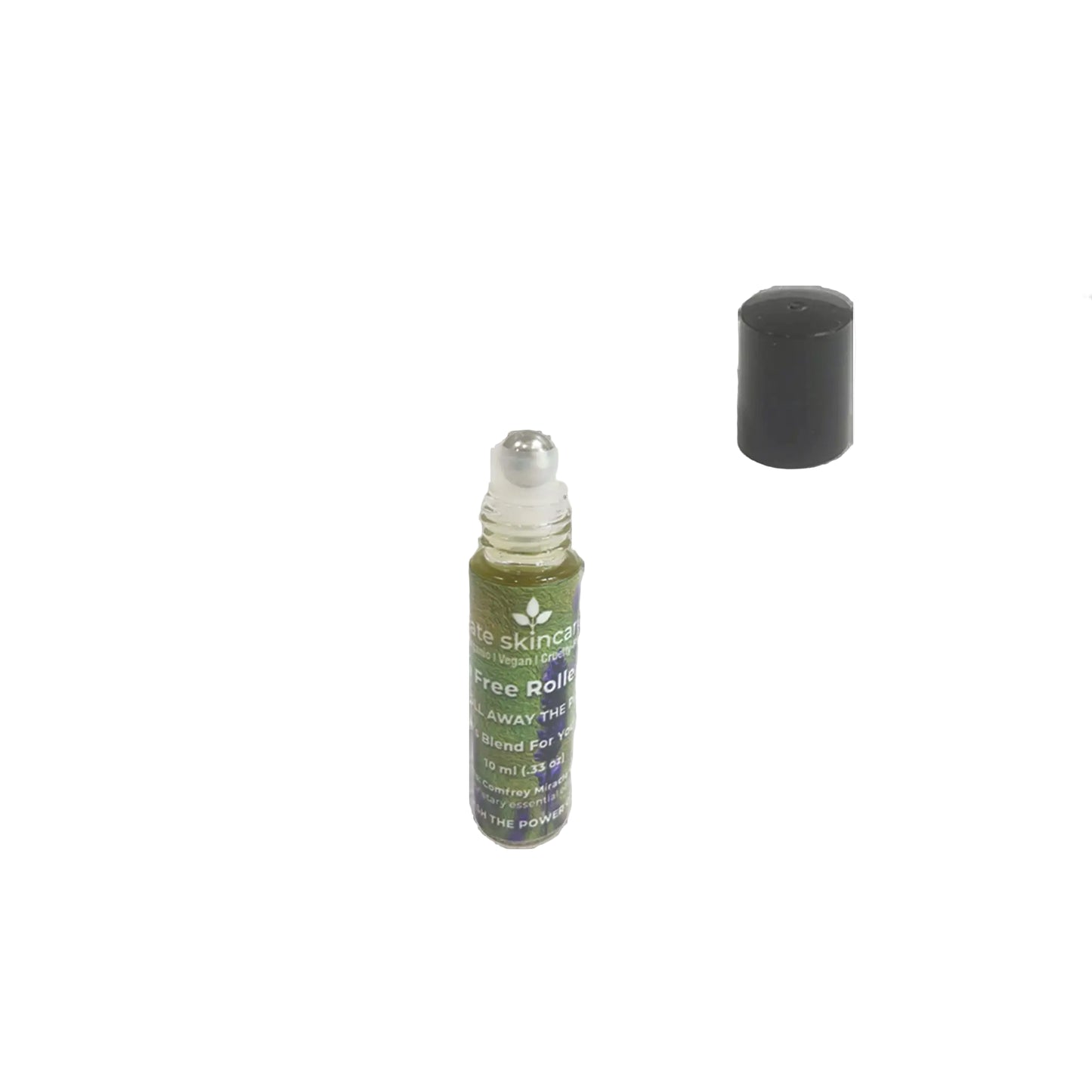 Open Fate Skincare Pain-Free Roller Ball showing stainless steel applicator with cap removed