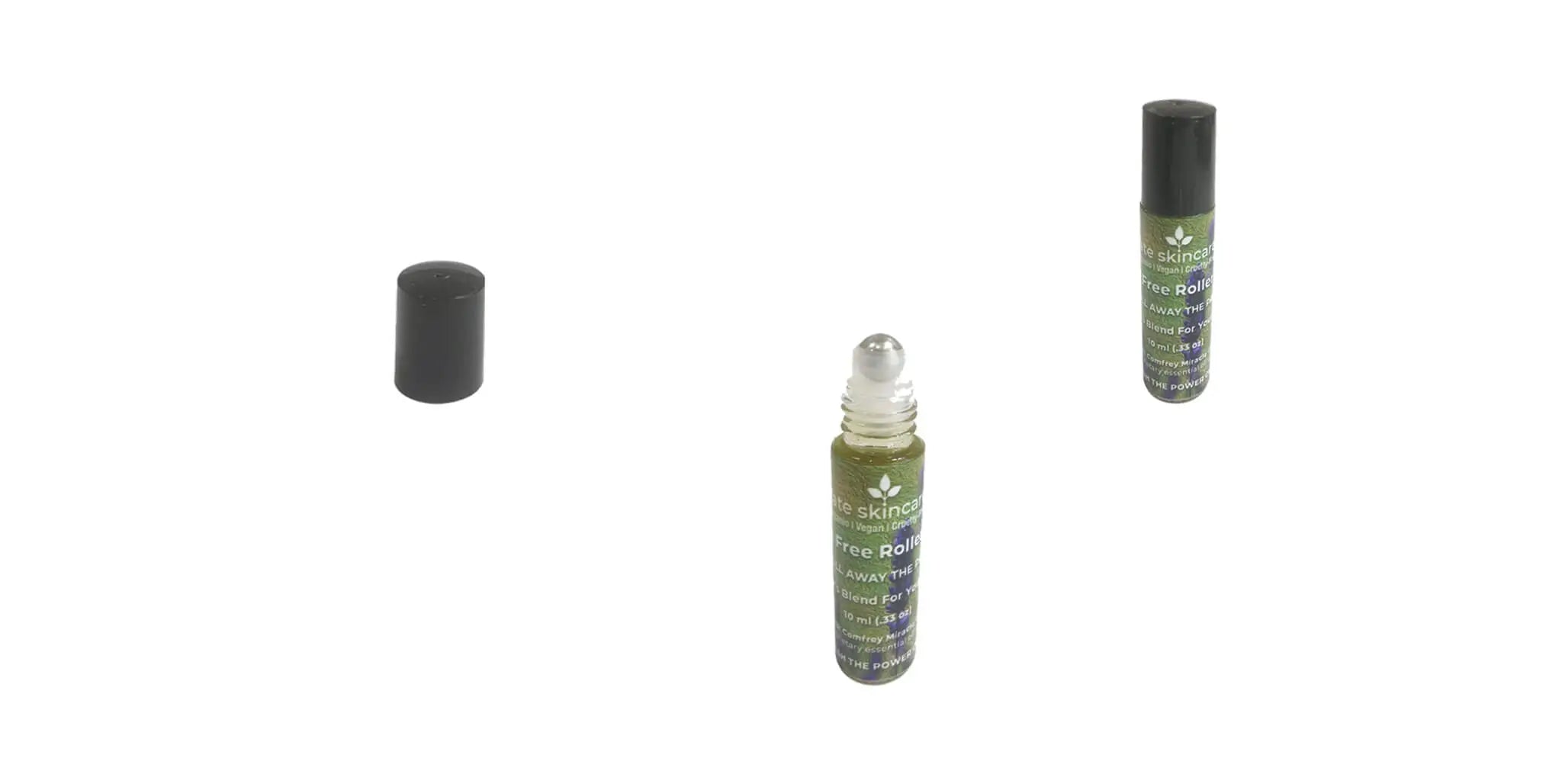 Fate Skincare Pain-Free Roller set displayed on a clean white background: cap on the left, open roller with silver ball in the center, and capped roller on the right — showcasing natural roll-on relief for pain, tension, and inflammation.
