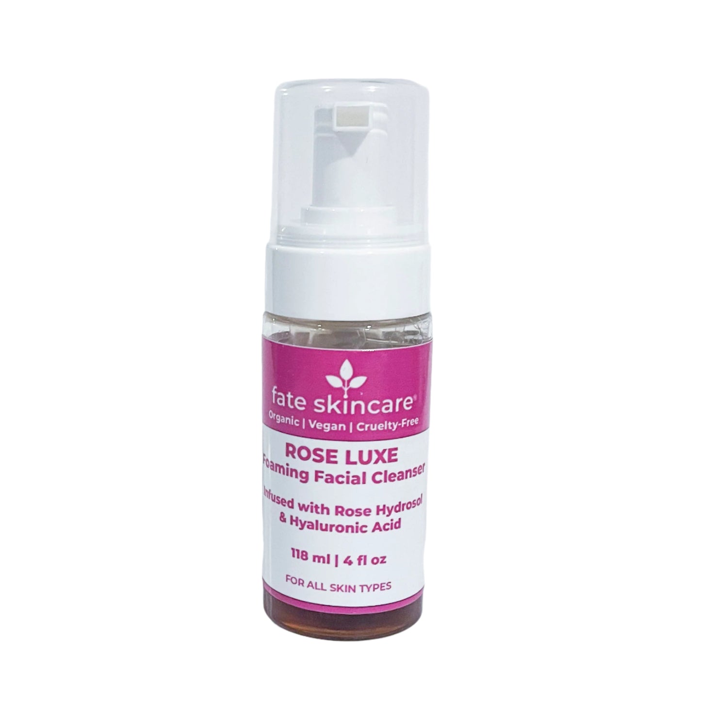 Fate Skincare Rose Luxe Foaming Facial Cleanser in a clear pump bottle with pink and white labeling, highlighting organic, vegan, and cruelty-free ingredients, including Rose Hydrosol and Hyaluronic Acid, suitable for all skin types. Bottle size is 118 ml (4 fl oz)."