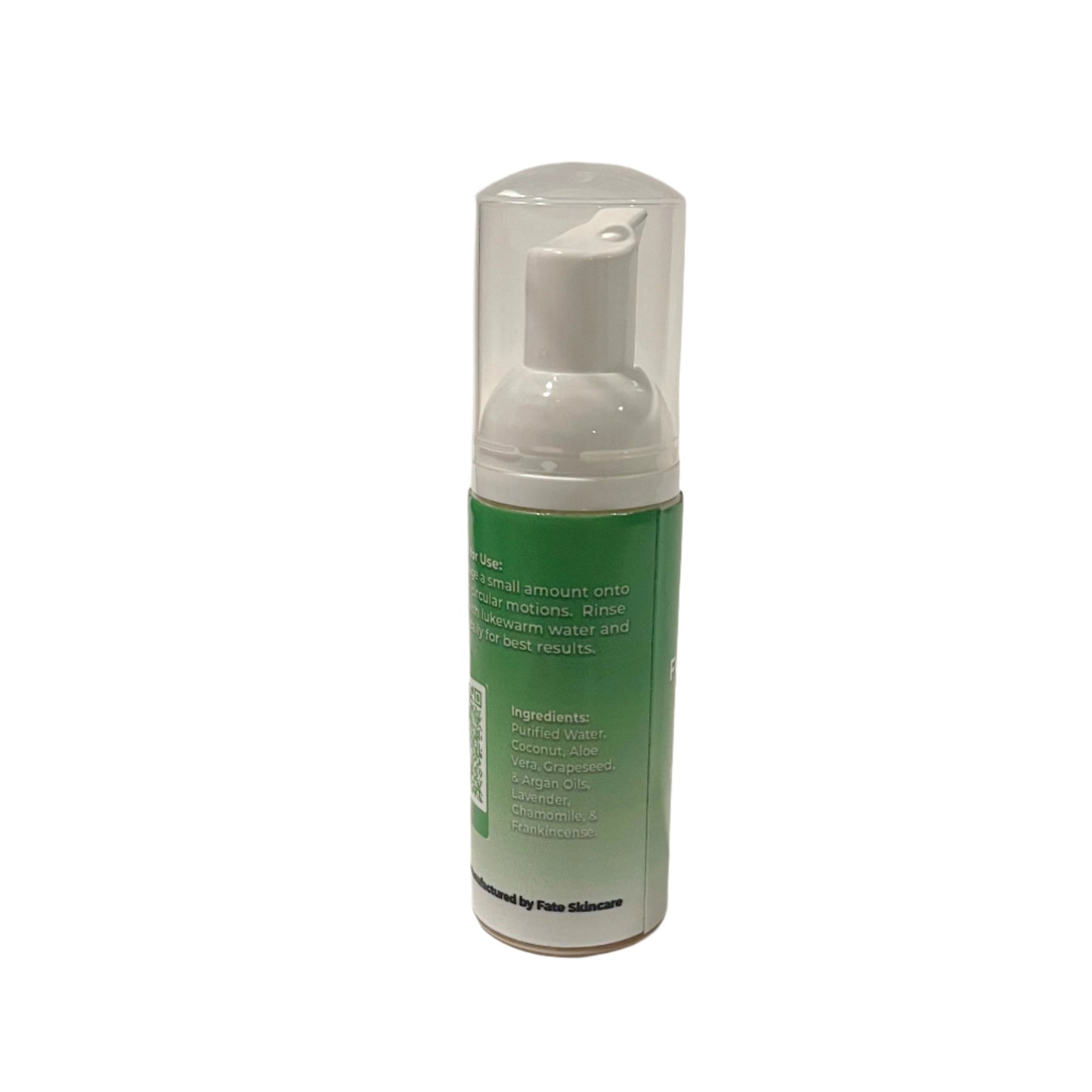 Side view of green-labeled Foaming Mousse Facial Cleanser listing ingredients such as aloe, grapeseed, and frankincense.