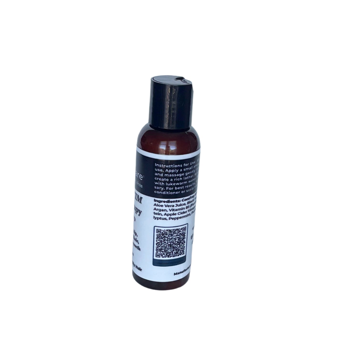 Side view of Fate Skincare’s Hydrostim Hair Therapy Shampoo displaying usage instructions, ingredients including aloe vera, argan oil, and apple cider vinegar, and a QR code for additional product info.