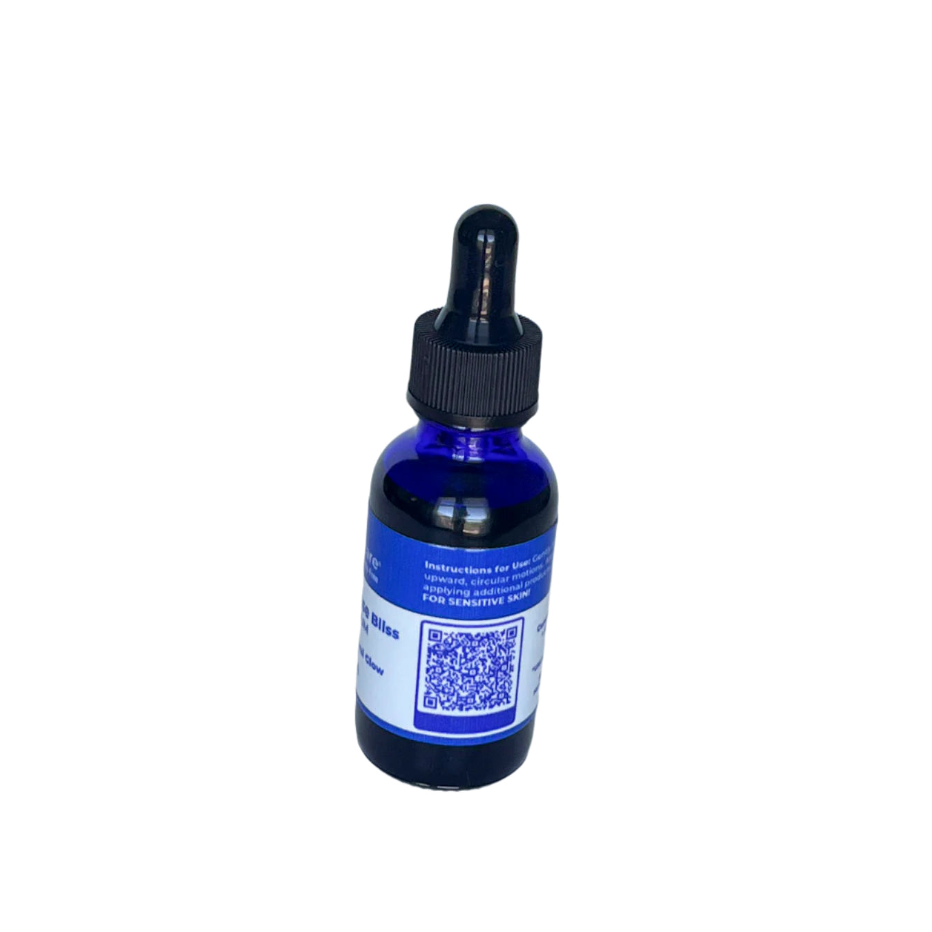 Side view of Fate Skincare's Lavender Rose Bliss Face Serum bottle, showing product instructions and a visible QR code linking to additional product details.
