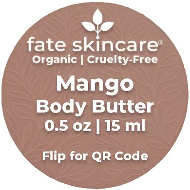 Fate Skincare Mango Body Butter label on a rose gold background. Text reads: ‘Fate Skincare – Organic | Cruelty-Free – Mango Body Butter – 0.5 oz | 15 ml – Flip for QR Code.’ Designed for a 0.5 oz tin, displayed against a white background.