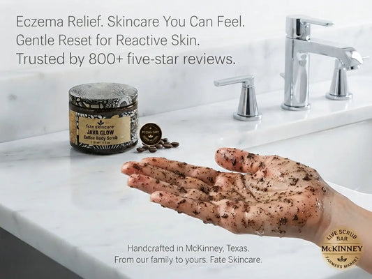 Hand holding Fate Skincare Java Glow Coffee Body Scrub™ with the coffee scrub displayed beside the product jar for gentle exfoliation.