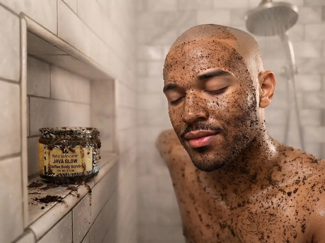 Man using Fate Skincare™ Java Glow Coffee Scrub™ on his face and scalp during an at-home shower and grooming routine.