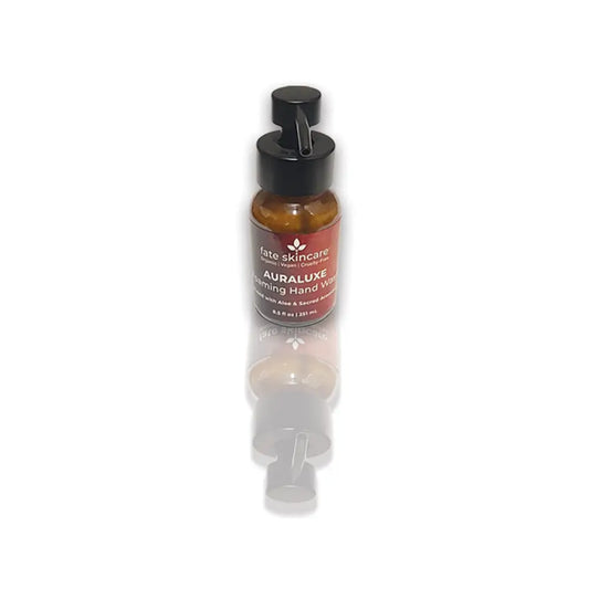 AuraLuxe™ Foaming Hand Wash by Fate Skincare in amber pump bottle, enriched with aloe and sacred botanicals.