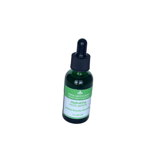 Front-facing image of Fate Skincare’s Hydrating Face Serum in a green glass bottle with a dropper top and white-green label reading “Radiate Beauty, Naturally.”