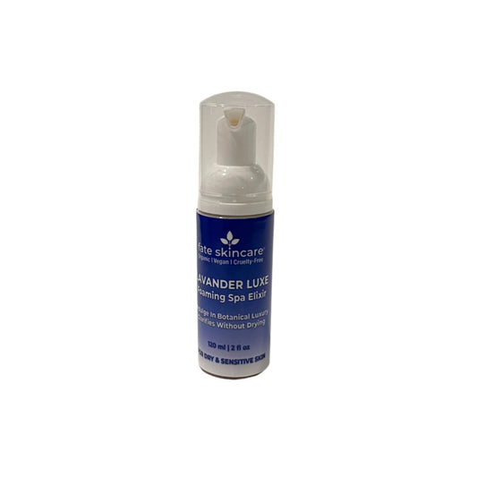 Fate Skincare Lavander Luxe Foaming Spa Elixir in a 120 ml blue bottle with a clear foaming pump, labeled for dry and sensitive skin.