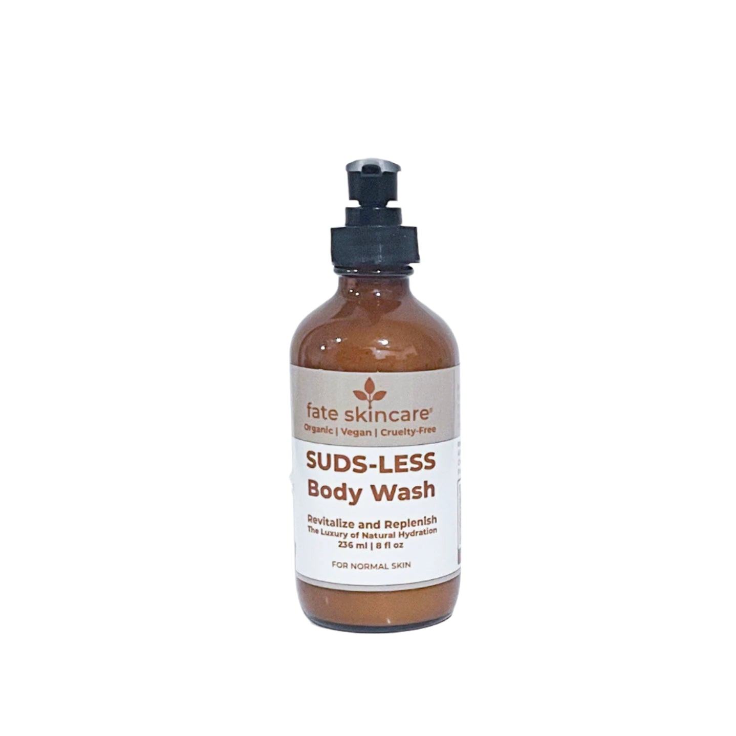 One bottle of Fate Skincare’s Organic Suds-Less Body Wash in an amber glass bottle with black pump, formulated for sensitive, dry skin and sulfate-free cleansing.
