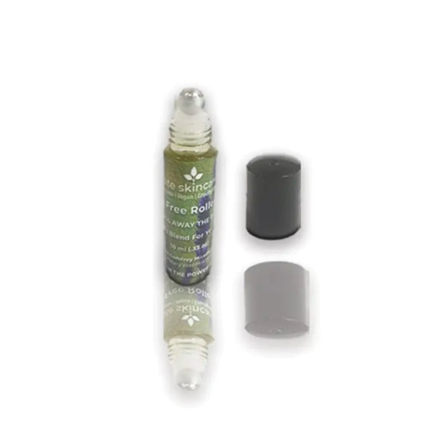 Pain-Free Roller Ball™ by Fate Skincare with cap removed, showing stainless steel roller tip for targeted herbal pain relief.